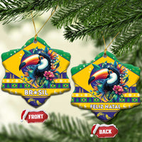 Two heart-shaped ceramic ornaments with toucan art: BRASIL and Feliz Natal.