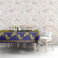 Christmas tablecloth with deep blue base and bright yellow zigzag motif