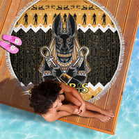Round beach blanket featuring Anubis in black and gold, zigzag trim, white fringe