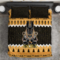 Black and orange bedding set with Anubis jackal graphic, gold border, and matching pillowcases