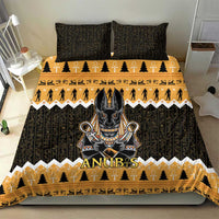 Anubis-themed bedding set in black and gold with orange accents and jackal center graphic
