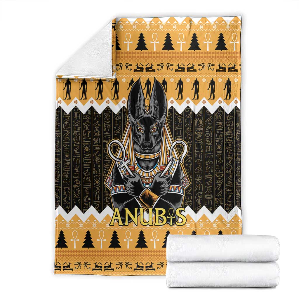 Orange and dark Anubis blanket with matching wrapped roll blankets, hieroglyph and tree motifs