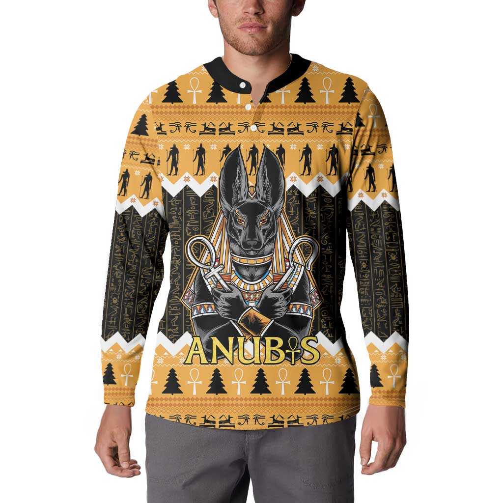 Men's orange and black button sweatshirt featuring large Anubis chest graphic and black trim
