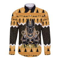 Orange long-sleeve button shirt with Anubis face graphic on front