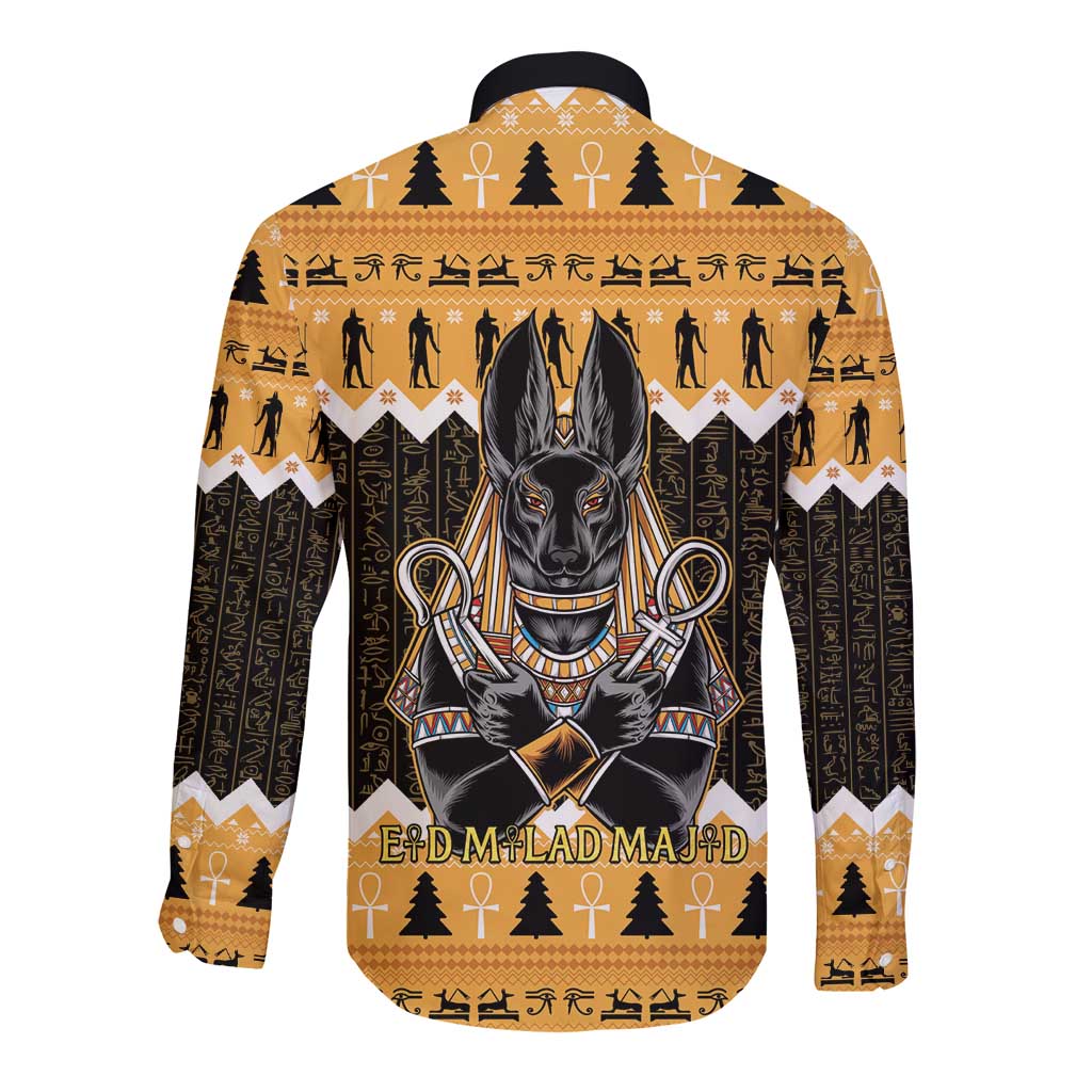 Orange long-sleeve button shirt with Anubis graphic and back text