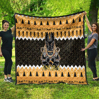 Orange and black Anubis quilt featuring central Anubis artwork and repeating row icons