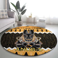 Round area rug with Anubis artwork, dark center and orange border