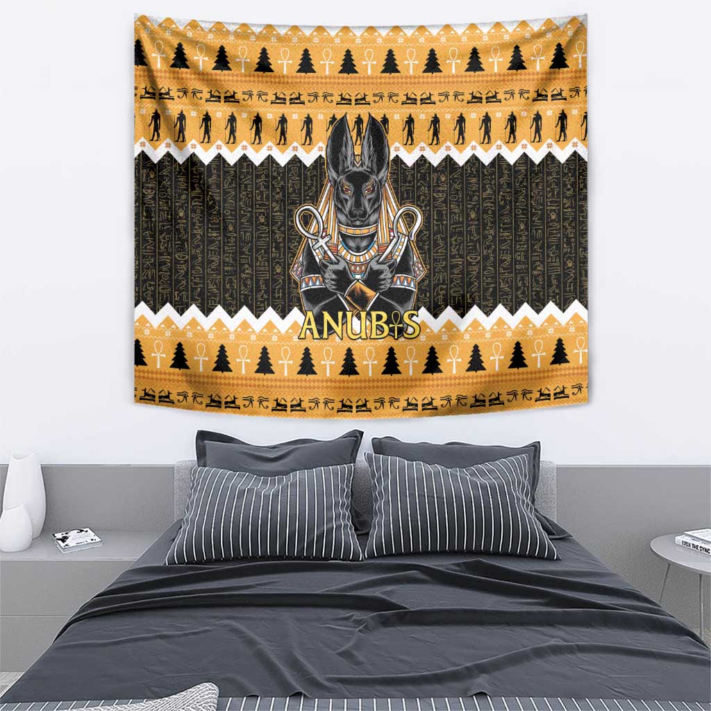 Orange and dark green Anubis wall tapestry with gold trees, figures, and zigzag bands
