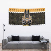 Dark green Anubis tapestry with orange top and bottom bands, gold border, and figures