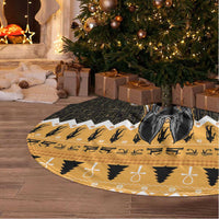Round Anubis tree skirt, orange-and-black with hieroglyph pattern and white fringe border