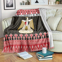 Egypt theme blanket with red, black, and white graphics and central gold shield
