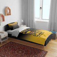 Personalized bedding set on wooden bed: yellow-and-black duvet with Buffalo Soldiers “Your Text”