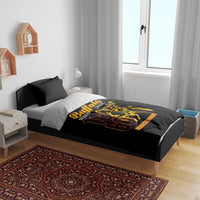 Black duvet cover set with Buffalo Soldiers 18 66 graphic, on a bed with two pillow shams.