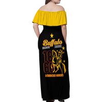 Off-shoulder maxi dress in black with yellow off-shoulder top and Buffalo Soldiers back graphic
