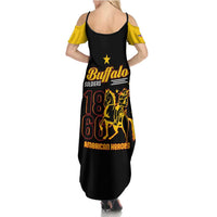 Black spaghetti-strap maxi dress with yellow shoulders and Buffalo Soldiers 1866–1964 graphic