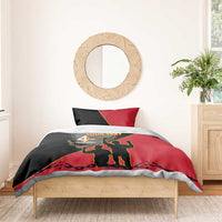 Personalised duvet with 'YOUR TEXT' graphic silhouettes in black and red, styled with two pillows