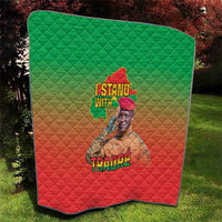 Green and red quilt blanket featuring Africa map, 'I Stand With' and portrait graphic.