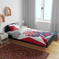 Liberia lion bedding set on bed: red/white/blue duvet with lion artwork and pillows
