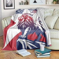 Lion flag print blanket, white with red, navy, and blue Liberia text and emblem