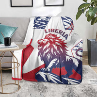Lion flag design blanket, white with red, navy, and blue Liberia lettering on front