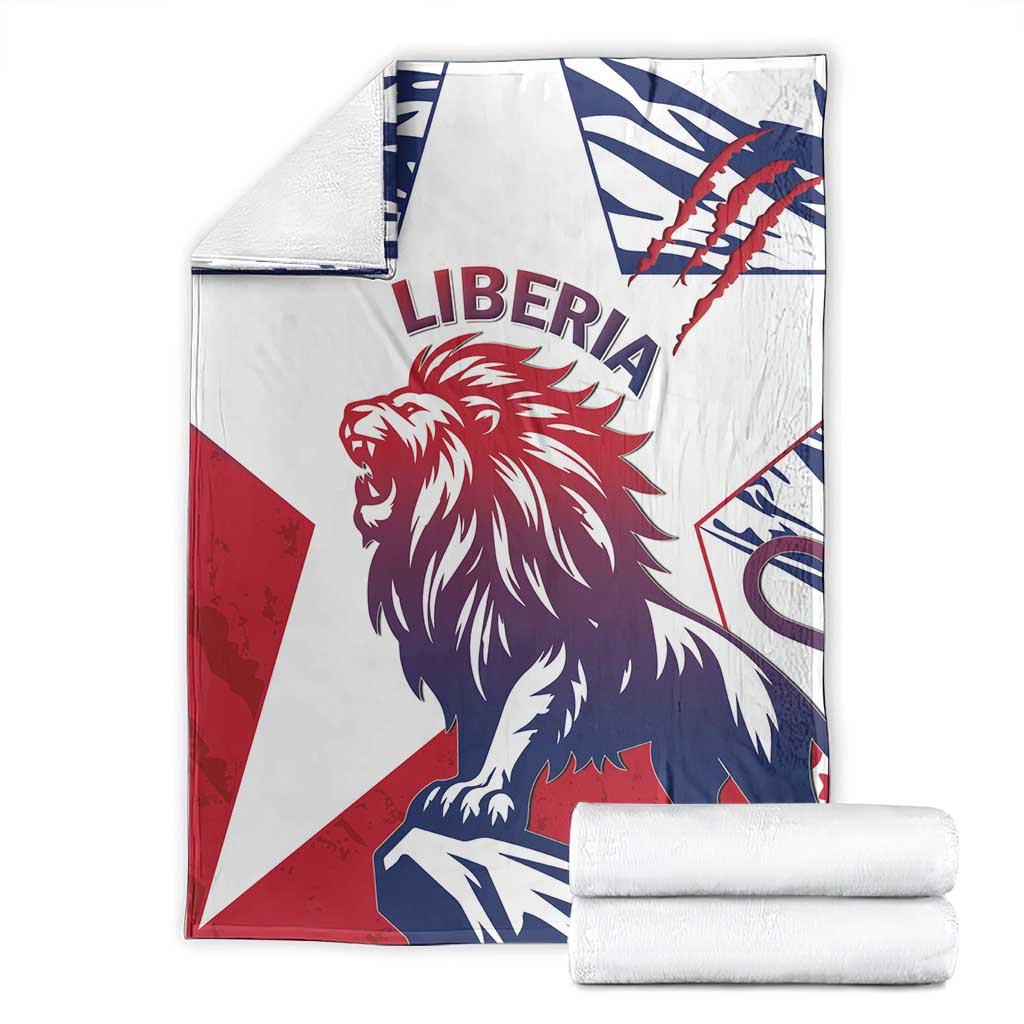 Folded lion flag print blanket, white with red and navy Liberia text and emblem
