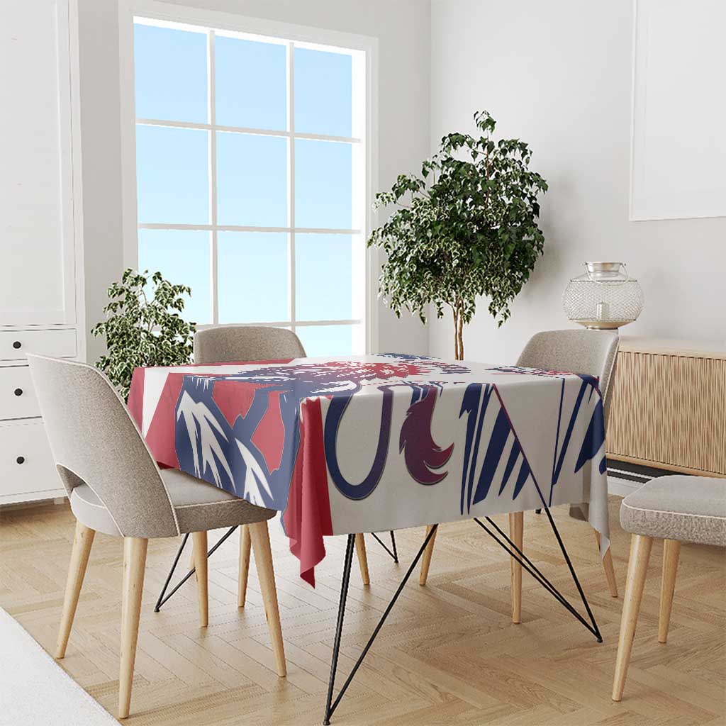 Lion grunge style tablecloth in red, navy and white, covers a dining table