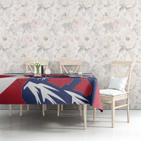 Lion grunge style tablecloth in red, navy and white, spread over dining table