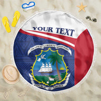 Round beach blanket with blue/red Liberia coat of arms and 'Your Text' banner.