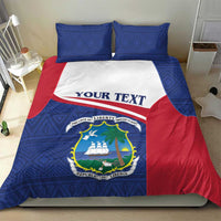 Personalized Liberia duvet cover with blue pattern, red side drape, white band and crest.