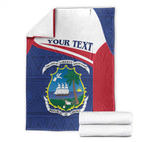 Folded Liberia blanket coat with blue front, red and white side panels, crest emblem
