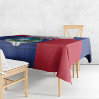 Blue and red Liberia coat of arms tablecloth draped over table edge