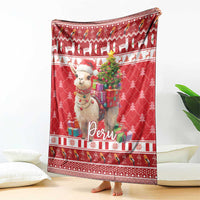 Red Christmas throw blanket with alpaca, trees, gifts, and “Peru” lettering