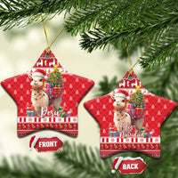 Red star-shaped ceramic ornament set with alpaca and gifts; includes Peru and Feliz Navidad text.