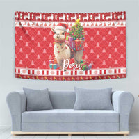 Red Christmas tapestry with alpaca holding gifts, Peru lettering, pine tree pattern and holiday stripes.