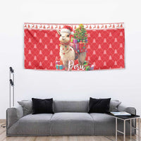 Red Christmas tapestry featuring an alpaca holding gifts and Peru lettering over a pine tree design.