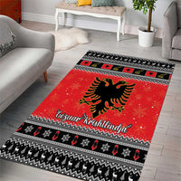 Red Christmas area rug with eagle graphic, snowflake accents, and black geometric border