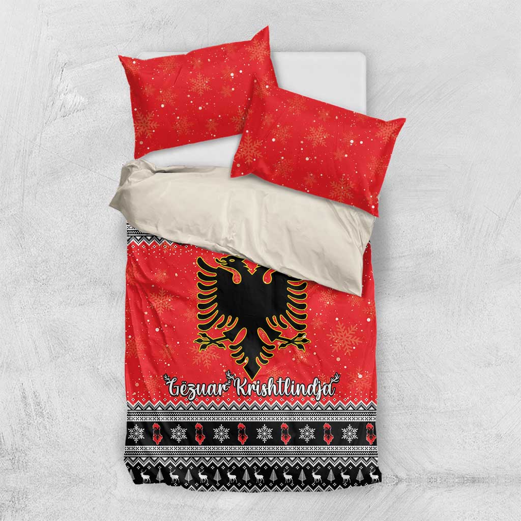 Red duvet cover with two pillows, eagle medallion and Christmas lettering at the bottom