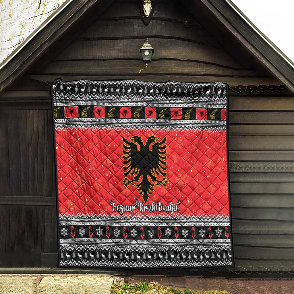 Red quilt blanket featuring Albanian eagle emblem, black-and-white festive border design