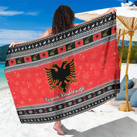 Red Christmas sarong with Albanian eagle, zigzag border and Gezuar Krishtlindja print