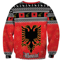 Unisex red Christmas sweatshirt with black Albanian eagle graphic and 'Albania' text