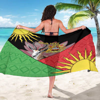 Personalized black gazelle sarong draped across back, green-red-yellow sunburst pattern