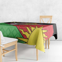Personalised Malawi tablecloth with flag graphic and gold sun design, over bench seating