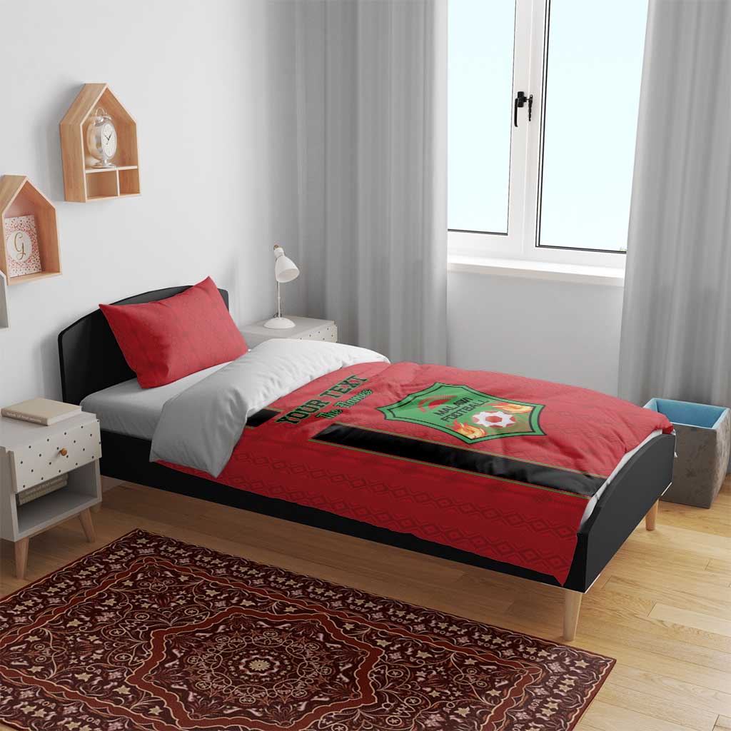 Red football bedding set with duvet and pillows, black stripe, Malawi Football emblem.
