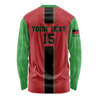 Long-sleeve football shirt back, red body with green sleeves, black stripe, number 15.