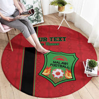 Round red football carpet featuring Malawi Football crest, black stripe, and flame text