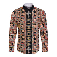 Long-sleeve button shirt with black collar, colorful face pattern, and vertical print
