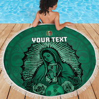 Green round beach blanket with tassel border, Virgin Mary holding hands, football icon, text