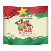 Wall tapestry with red top border, green bottom, yellow star, and portrait figures