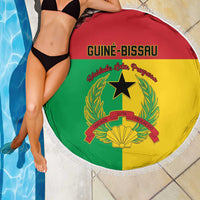 Round beach blanket with Guinea-Bissau flag print draped by poolside, white fringe