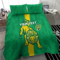 Green duvet cover bedding set with lion face graphic, yellow stripe, and shield badge